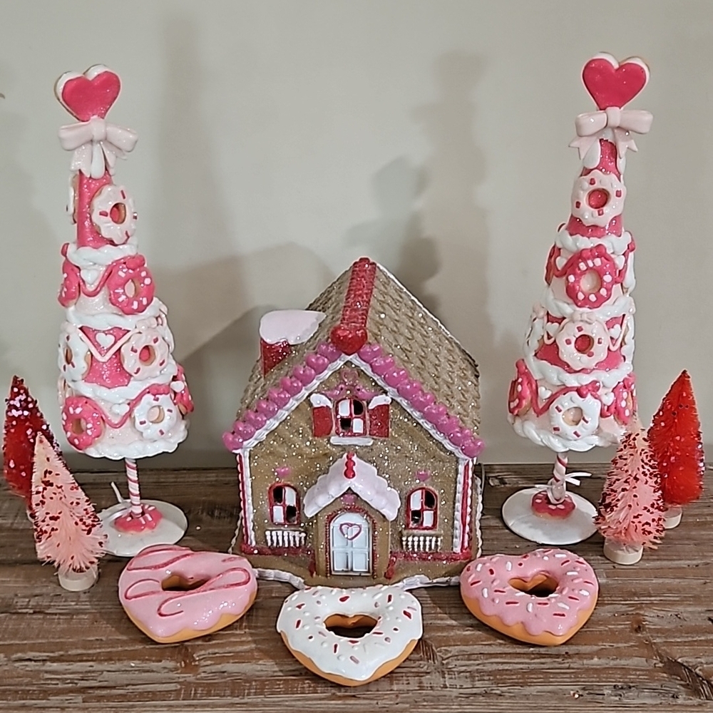 Festive Gingerbread House with Pink and White Decorations